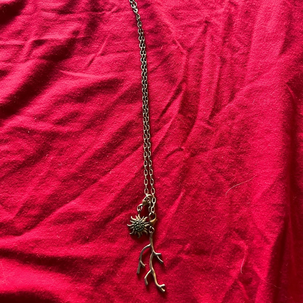Lia Sophia charm necklace with sun and coral charms
